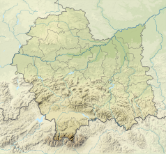 Mapa konturowa województwa małopolskiego, w centrum znajduje się czarny trójkącik z opisem „Lubomir”