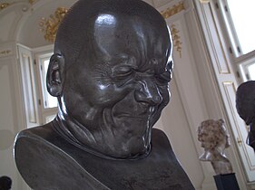 An Arch-Rascal (n.° 33 en una serie de personajes)) (desp.1770) de Franz Xaver Messerschmidt Österreichische Galerie Belvedere, Vienna, Austria[37]​