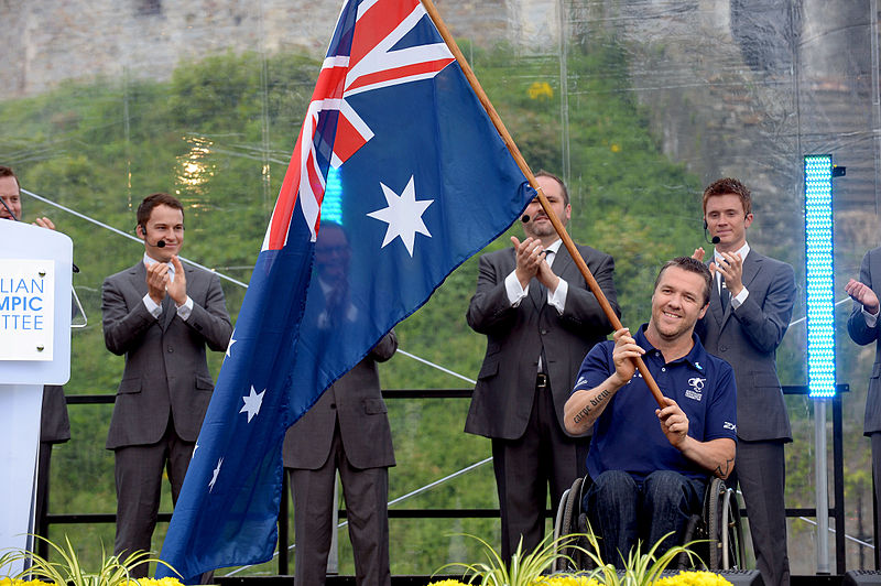 File:210812 - Greg Smith 2012 Flag bearer Australian Paralympic Team - 3b - ceremony photo.jpg