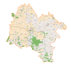 Mapa konturowa powiatu strzelińskiego, w centrum znajduje się punkt z opisem „Strzelin”