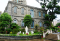 Side of the Cathedral Rectory. The Good Shepherd Sculptural Group is in the foreground.