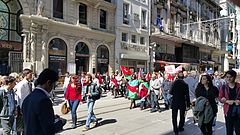 Photograph of people walking on a street protesting against Armenian claims of genocide