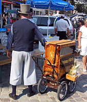 A street organ player in Warnemünde, Germany