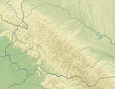 Mapa konturowa Beskidów Wschodnich, blisko centrum na dole znajduje się czarny trójkącik z opisem „Unhariaska”