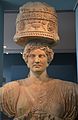 The upper part of one of the two caryatids that flanked the Lesser Propylaea of the sanctuary of Demeter and Kore at Eleusis.