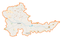 Mapa konturowa powiatu proszowickiego, blisko centrum na lewo znajduje się punkt z opisem „Proszowice”