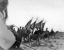 1911 photograph of Ibn Saud's Ikhwan forces, which initially fulfilled the role that would later be taken over by both the Military of Saudi Arabia and the Saudi Public Security Forces.