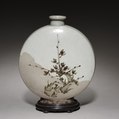 Korean Joseon dynasty buncheong ware wine flask depicting plum blossom (ume) on the other side