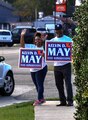 Louisiana House of Representatives District 75 candidate Kelvin May campaigning in Bogalusa with his wife on runoff election day November 18, 2023.