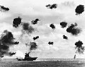 USS Yorktown being hit by a torpedo