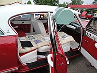 Fully reclining front seat backs to form a bed in a 1954 Nash Ambassador