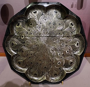 Jean Dunand, Peacock tray, nickel and silver in a peacock feather design, (1914), Musée d'Orsay, Paris.