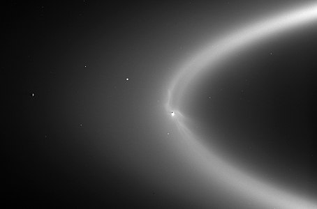 Enceladus orbiting within Saturn's E ring