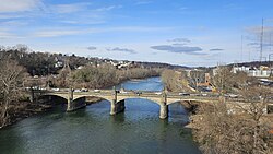 A color photograph of a bridge over a river