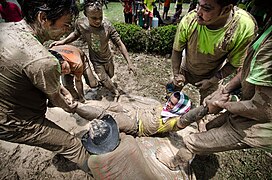 Mud plays a big role at the Yasothon Rocket Festival in Thailand