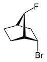 2-endo-bróm-7-syn-fluór-bicyklo[2.2.1]heptán