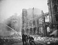 Image 31Firefighters putting out flames after an air raid during The Blitz, 1941 (from History of London)