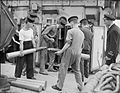 Crew storing fixed rounds on the Kingfisher class sloop HMS Widgeon, August 1943