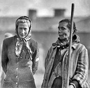 Liberated Bergen-Belsen survivor with a late war ersatz variant (left) showcasing no cloth patch, but a prominent N marked on the outer clothes