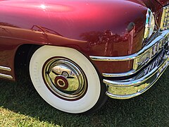 Wide whitewall tires were popular on premium automobiles