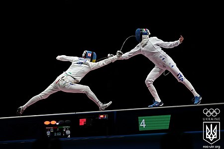 Ihor Reizlin scores in his individual men's épée Olympic bronze medal match