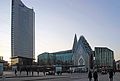 The Augusteum of the University of Leipzig with the highrise to the left.