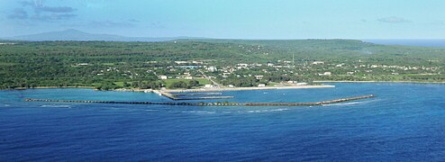 Aerial village of the town of San Jose, Tinian, and the harbor.jpg