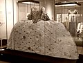 [131]"Mantua gown made from an ivory silk brocaded in a pattern of stylised flowers and leaves."