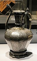 Homberg ewer, by Ahmad al-Dhaki al-Mawsili. Inlaid Brass with Christian Iconography. probably Mosul, dated 1242–43.[33]