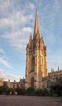 University Church of St Mary the Virgin seen from Radcliffe Square in Oxford, England, with evening light hitting the tower.