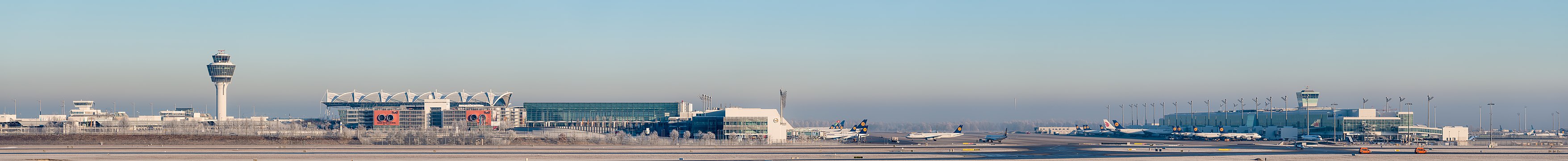 Munich Airport (IATA: MUC; ICAO: EDDM) terminal 2 and tower in February of 2015.