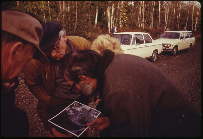 File:KITSAP COUNTY AUDUBON SOCIETY MEMBERS ON A FIELD TRIP CHECK ORIENTATION USING AN AERIAL PHOTOGRAPH. THEY ARE ON THEIR... - NARA - 557004.jpg