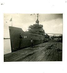 USS Starling Docked in Shanghai with sailor.