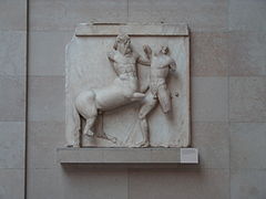 Sculpture of a fight between a man and a centaur.