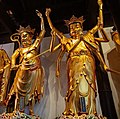 Statue of Mārīcī (right) as one of the Twenty-Four Protective Deities in Jade Buddha Temple, Shanghai, China