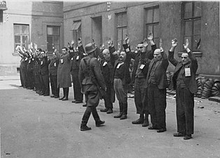 NARA copy #4, IPN copy #4 The Jewish department heads of the armament firm Brauer Herman Brauer helm repair shop at Nalewki 28-38