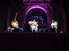 Sissoko (left) performing with 3MA during a concert in Cartagena, Spain.