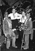 Miners and pioneers pose in front of the Banner of Krivoi Rog. 1952.