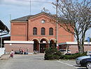 Bahnhof Guben mit Bahnhofsempfangsgebäude, Bahnsteigüberdachungen der Bahnsteige 2 und 3, Wasserturm