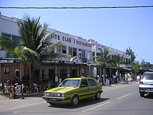 A building labelled "NITE CLUB & RESTAURANT" next to a two-way road