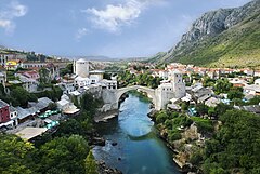 Second place: Stari Most, the "Old Bridge", which connects the two banks of river Neretva, has been a symbol of Mostar for centuries. This view from north shows Helebija tower to the left and Tara tower to the right. It was made from the minaret of Koski Mehmed Pasha Mosque. (POTD) – Credit: Own work by Ramirez. (GFDL, CC-BY-SA-3.0,2.5,2.0,1.0)