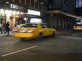 A New York City taxicab in motion. Photo taken on W. 46th st in Manhattan.