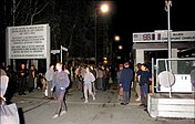 People walking through Checkpoint Charlie in Berlin