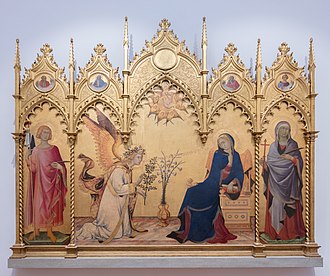 An altarpiece with a golden background and a frame surmounted by five richly carved Gothic pediments. Centre, the Virgin Mary, who has been reading, turns in alarm as the Angel Gabriel kneels to the left. The angel's greeting "Ave Maria, Gratia Plena" is embossed on the gold background. The figures are elongated, stylised and marked by elegance. There are saints in the side panels.