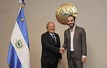 A color photograph of Salvador Sánchez Cerén and Nayib Bukele shaking hands