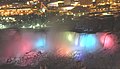 American Falls in winter at night with multicolor lighting