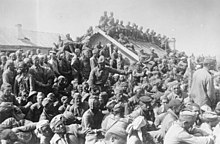 A large group of prisoners of war, outdoors