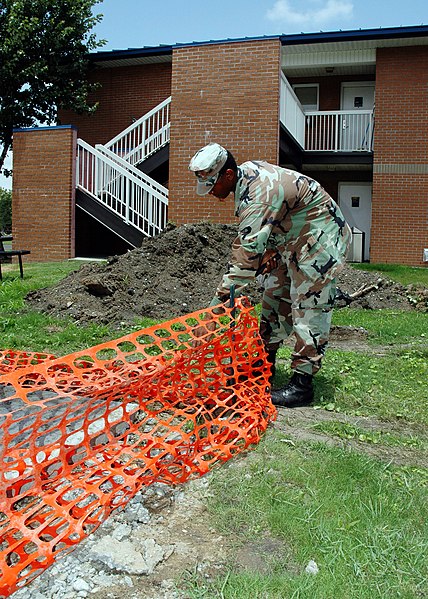 File:US Navy 070608-N-7427G-001 Builder 2nd Class Brian Hopson prepares to unveil a new hurricane proof pavilion near the barracks on Naval Air Station Joint Reserve Base, New Orleans.jpg