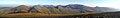 Panorama of some of the Snowdon Massif including Snowdon (centre right) taken from Mynydd Mawr. The Glyderau are visible in the distance