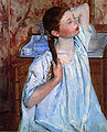 Jeune fille se coiffant de Mary Cassatt